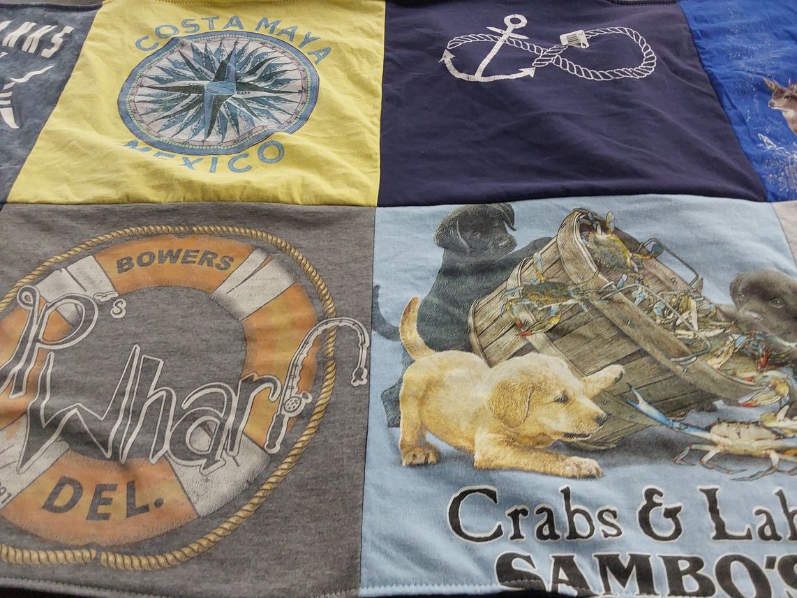 T-shirt quilt with fishing, marine life themes by Susan from MD