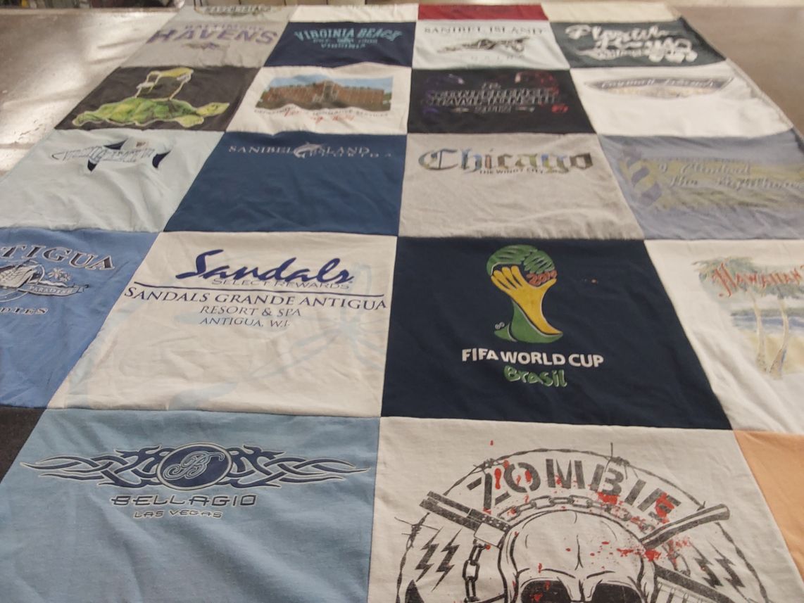 T-shirt quilt with travel, vacations themes by Ken from MD