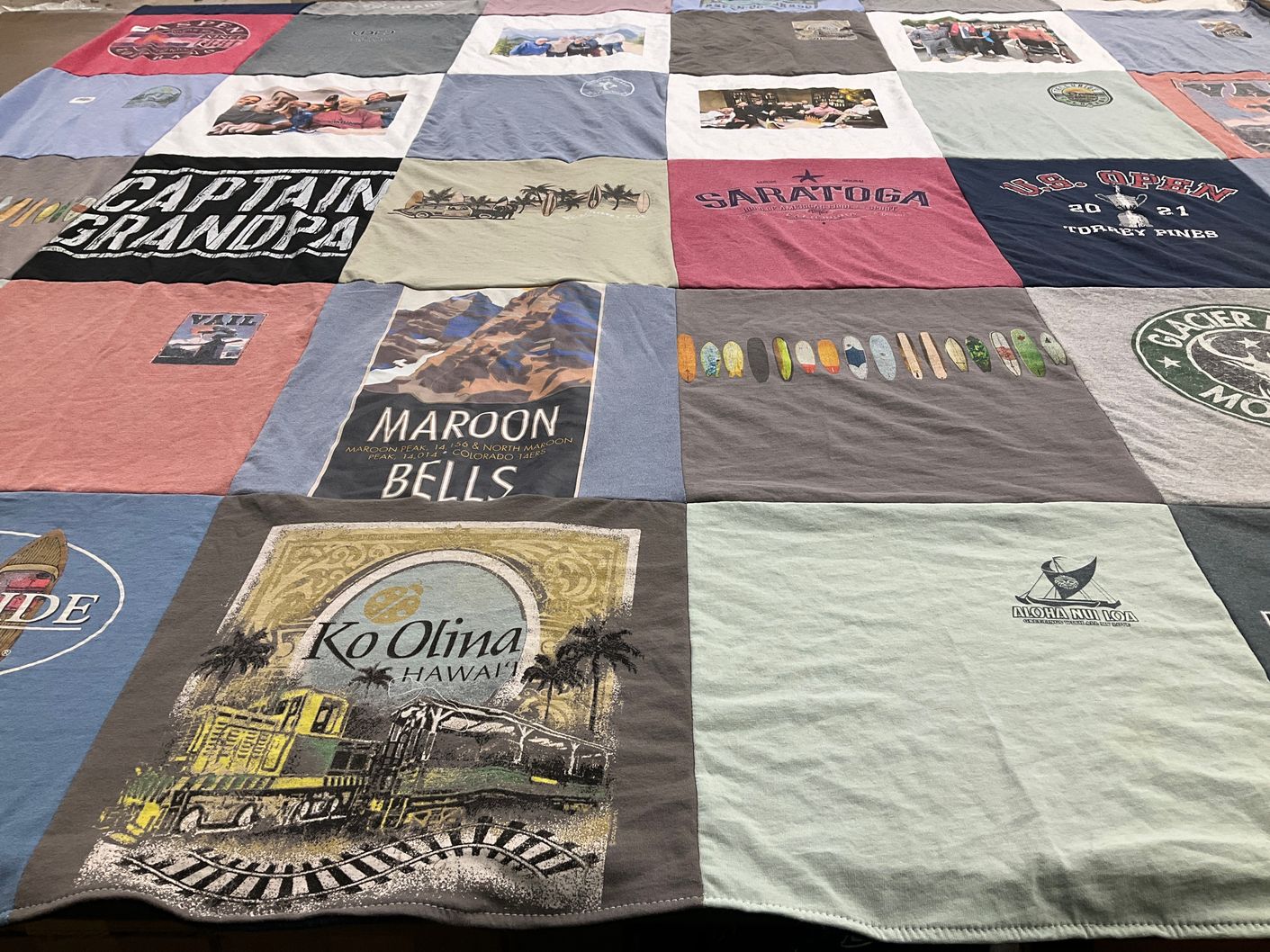 T-shirt quilt with travel, golf themes by Norma from CA