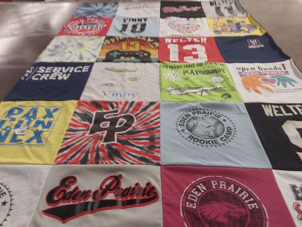 T-shirt quilt from eden prairie high school by Jeannie from MN