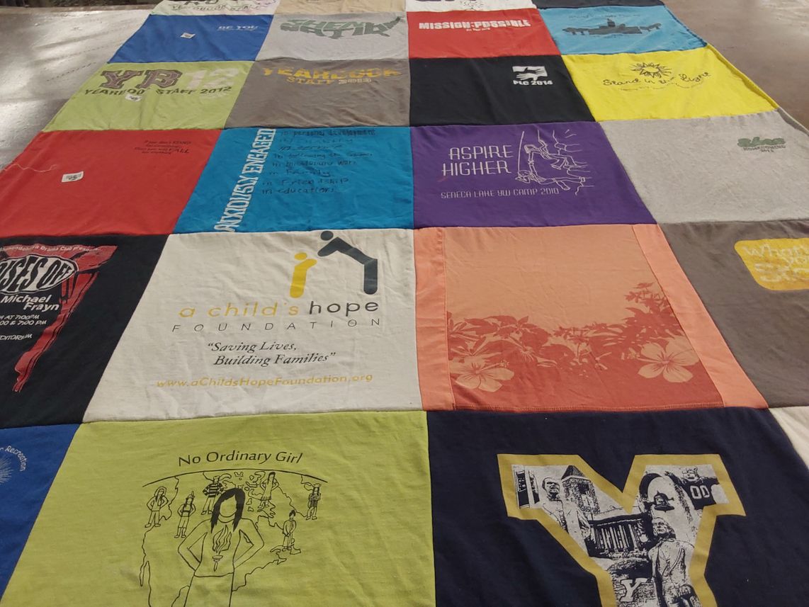 T-shirt quilt with camping, education themes by Megan from UT