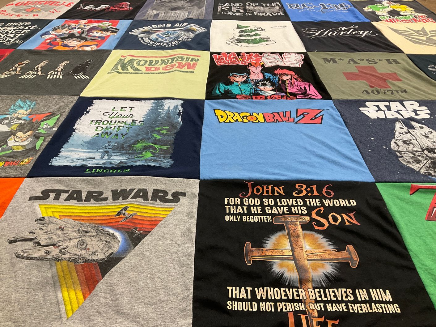 T-shirt quilt with anime, science fiction themes by BETTY from IN