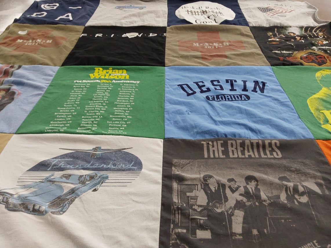 T-shirt quilt with music, travel themes by Anita from AL