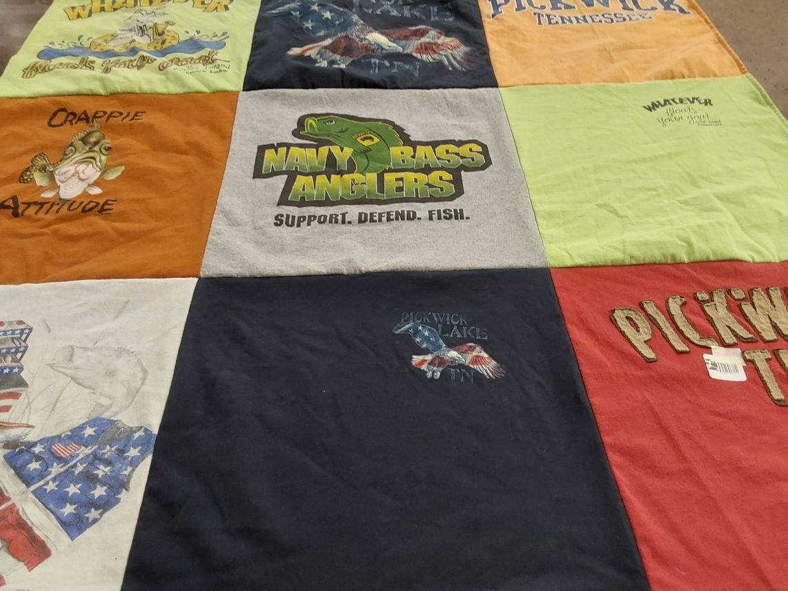 T-shirt quilt with fishing themes by Elizabeth from MS