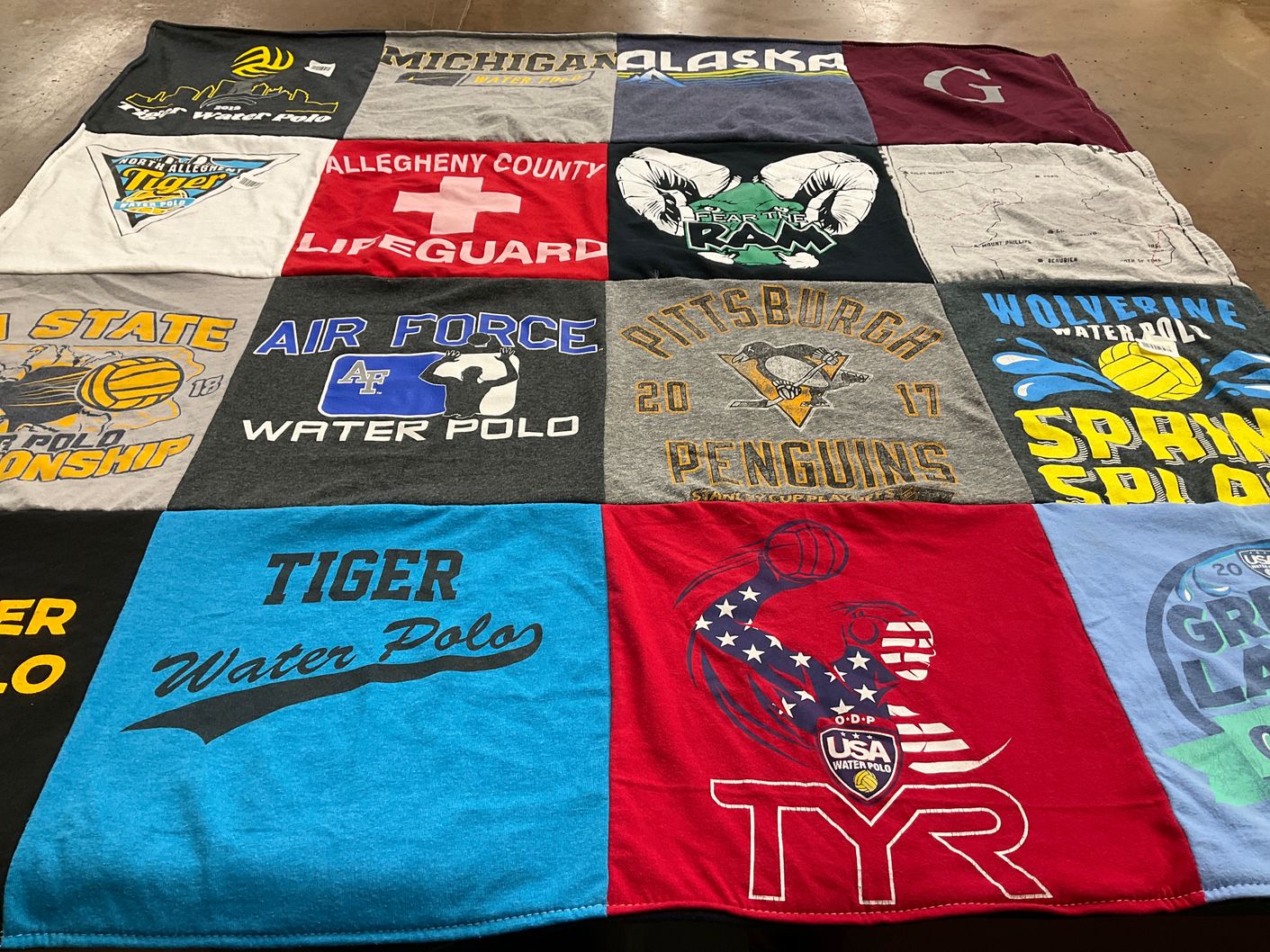 T-shirt quilt featuring pittsburgh penguins, michigan wolverines by Heather from PA