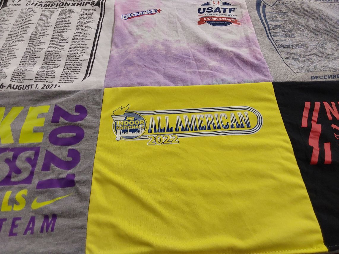 T-shirt quilt with track and field, sports themes by Rylee from NY