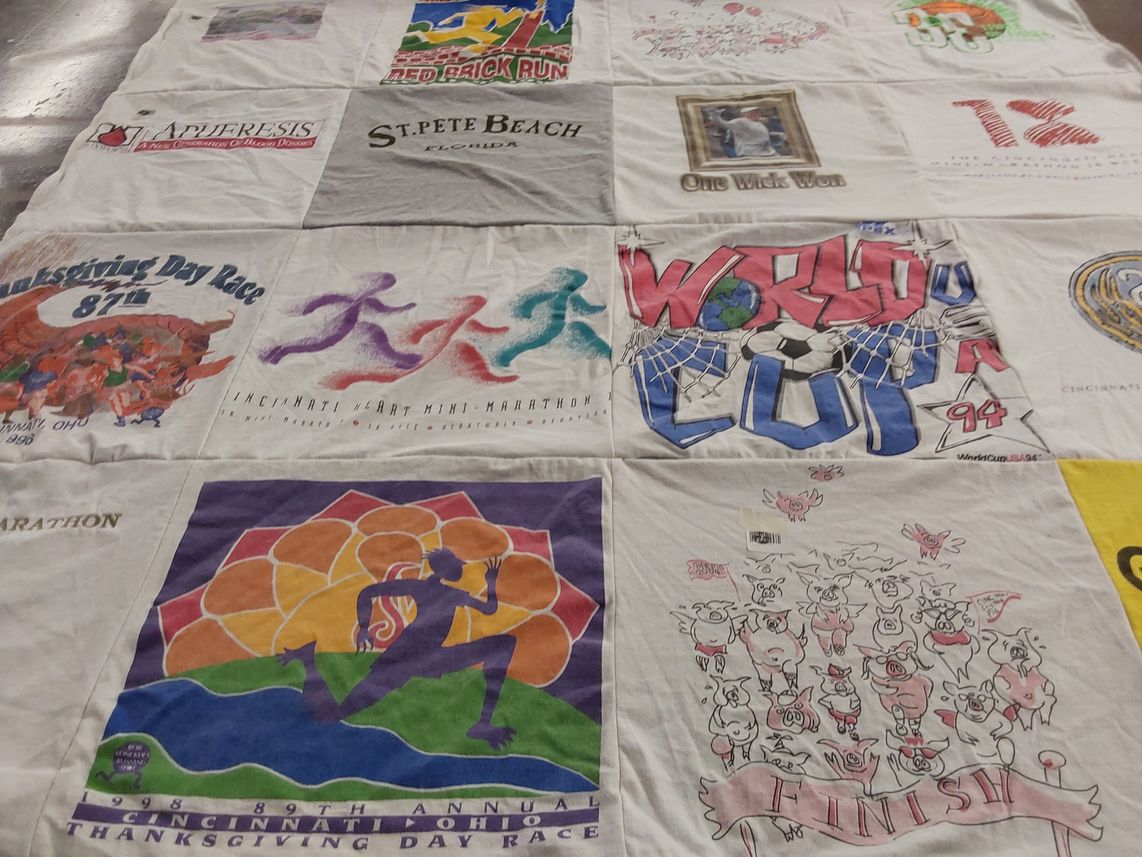 T-shirt quilt with running, sports themes by jennifer from FL