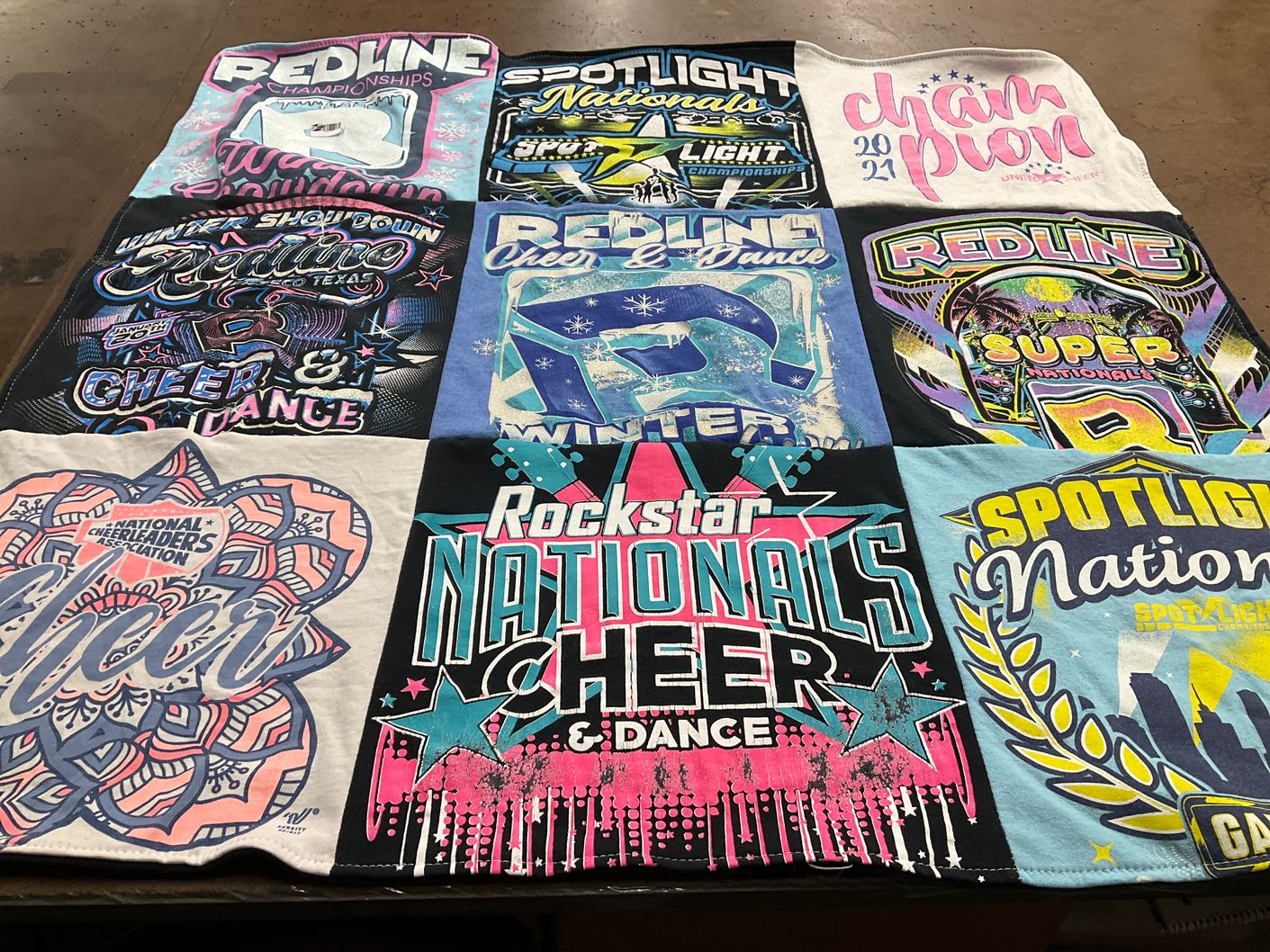 T-shirt quilt with cheerleading, dance themes by Ashley from TX
