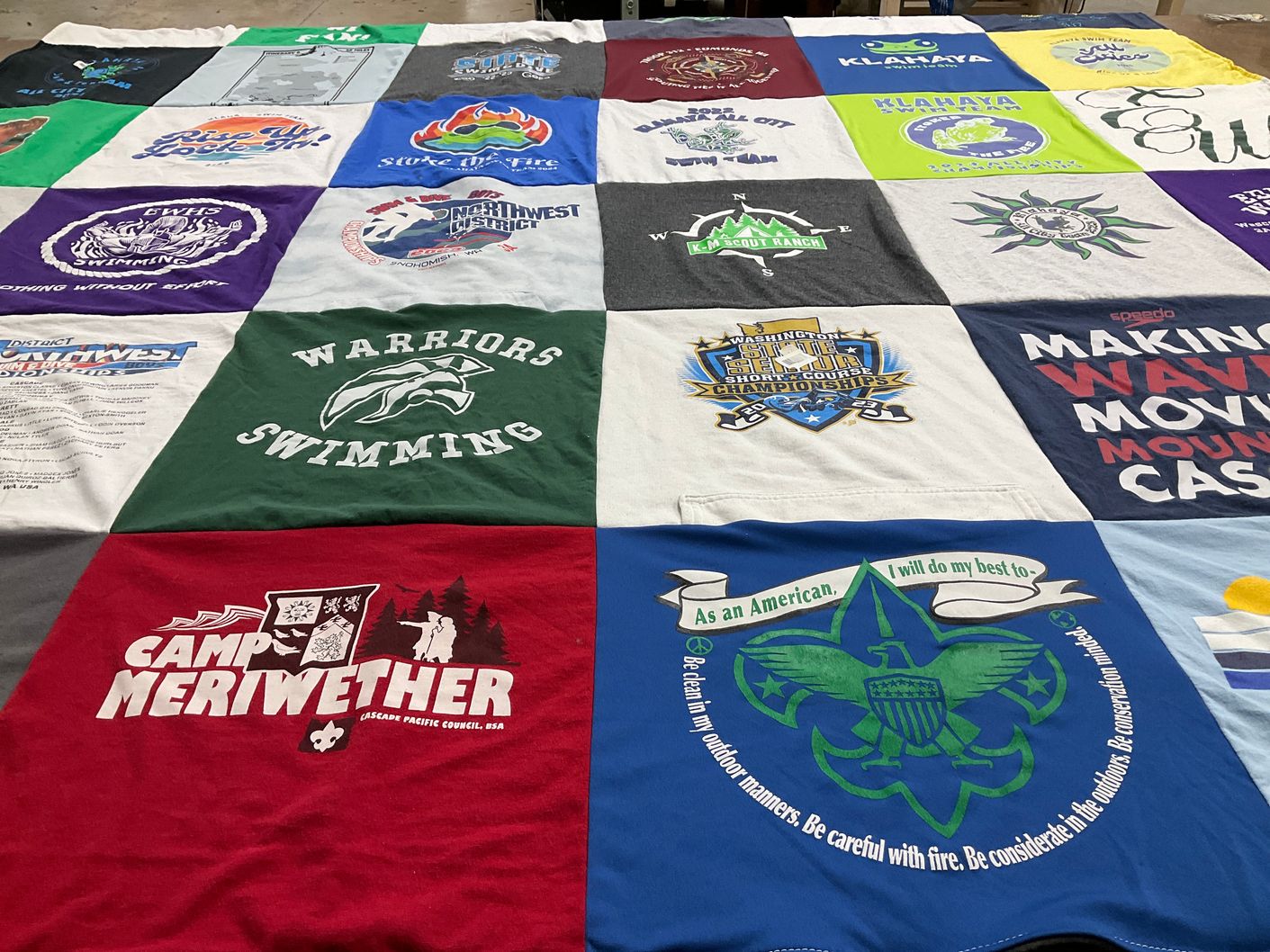 T-shirt quilt featuring warriors swimming by Jessica from WA