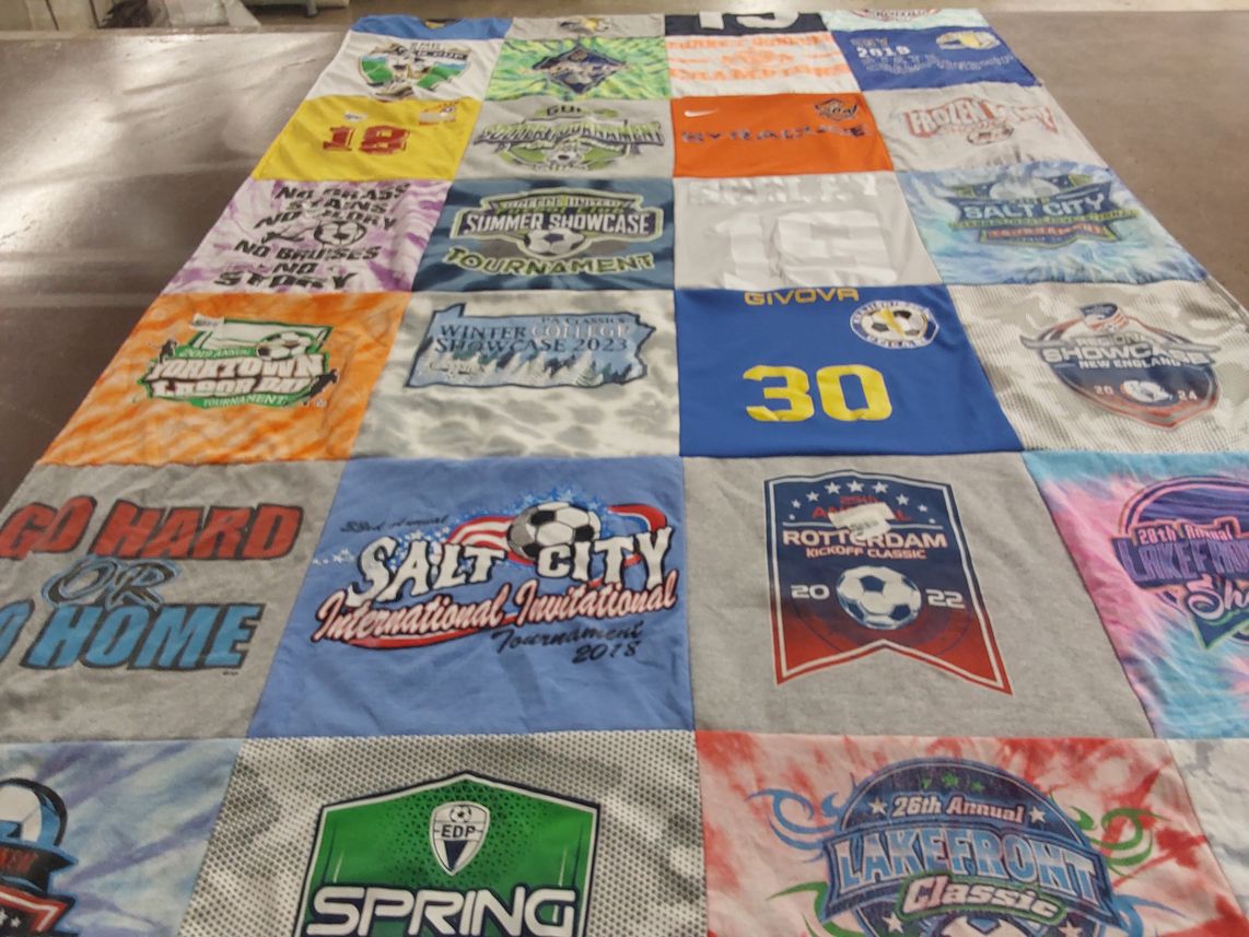 T-shirt quilt with soccer tournaments, youth sports themes by Mackenzie from NY
