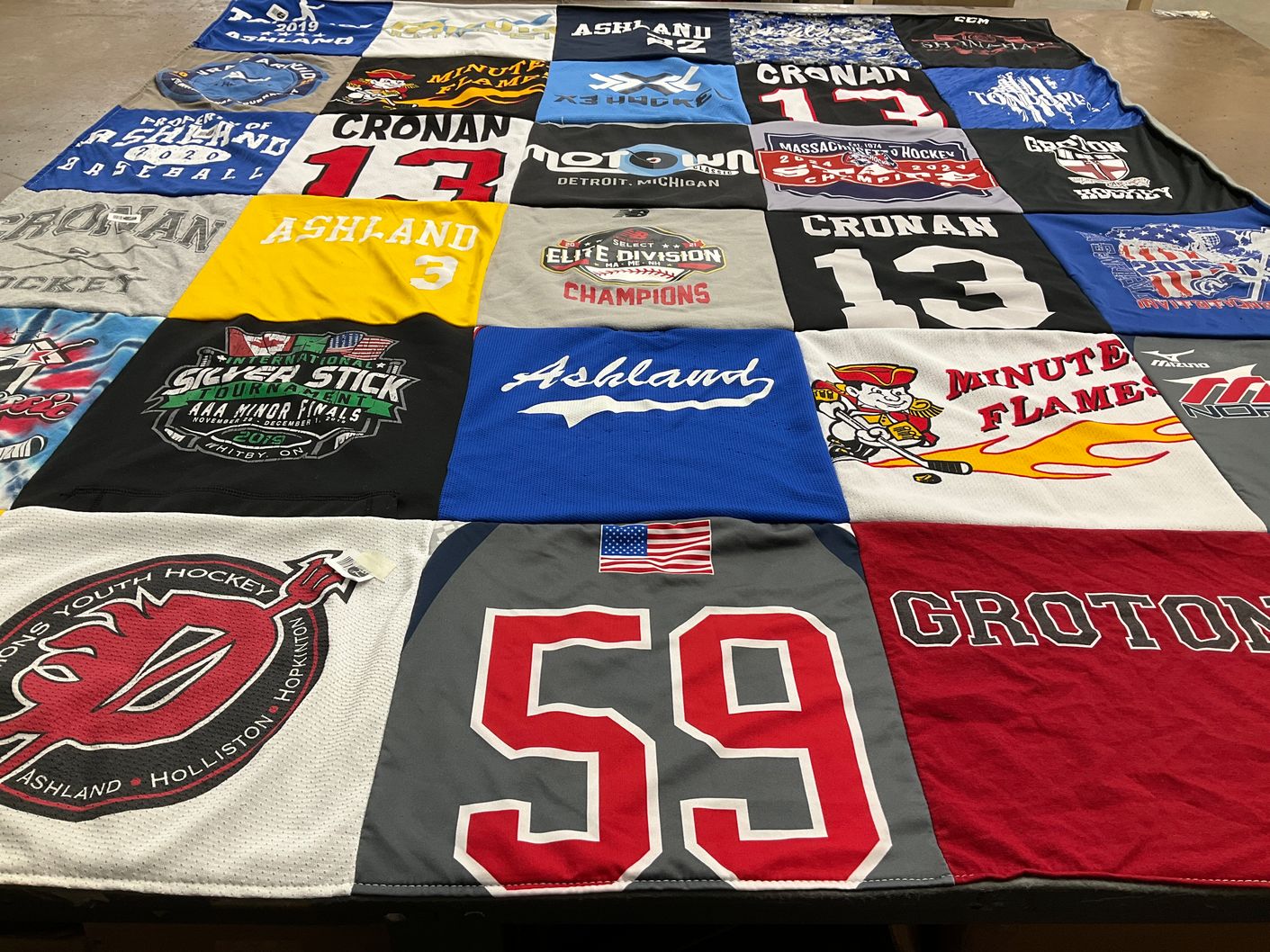 T-shirt quilt featuring ashland youth hockey by Erica from MA
