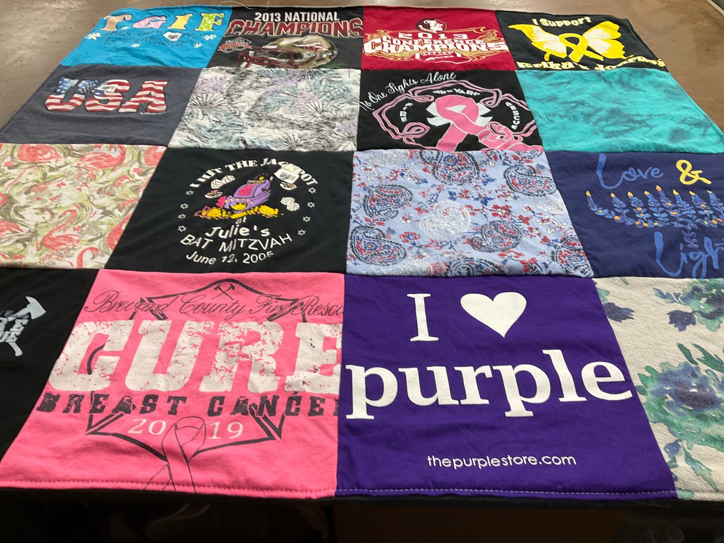 T-shirt quilt with charity, sports themes by Elaine from FL