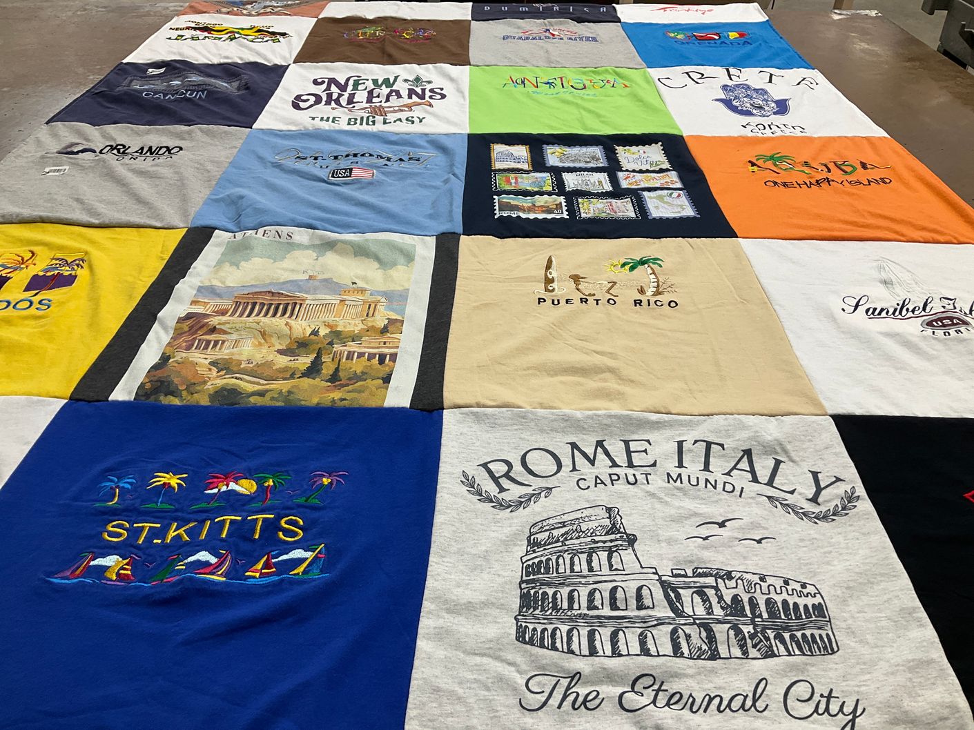 T-shirt quilt with travel, vacation themes by Roxanne from NH