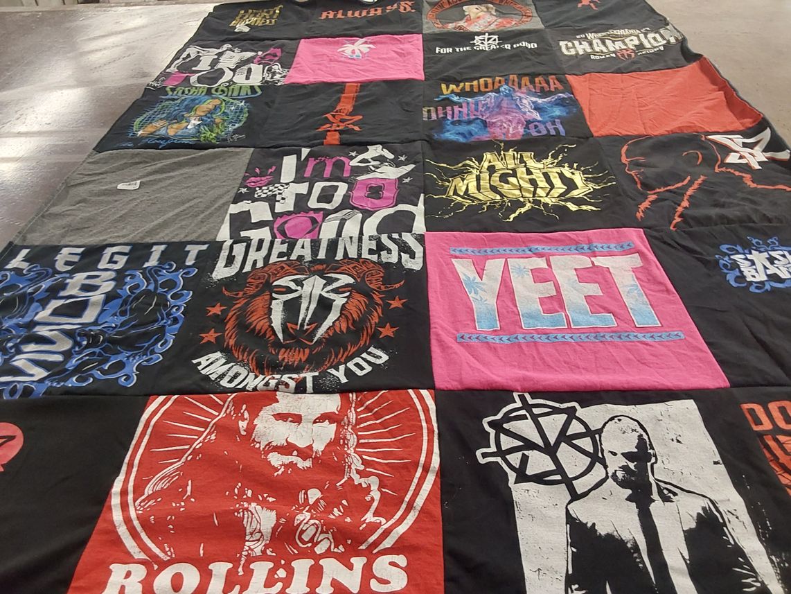T-shirt quilt with wrestling, pop culture themes by Paulma from VA