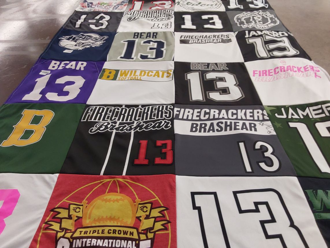 T-shirt quilt with softball themes by Rebecca from CA