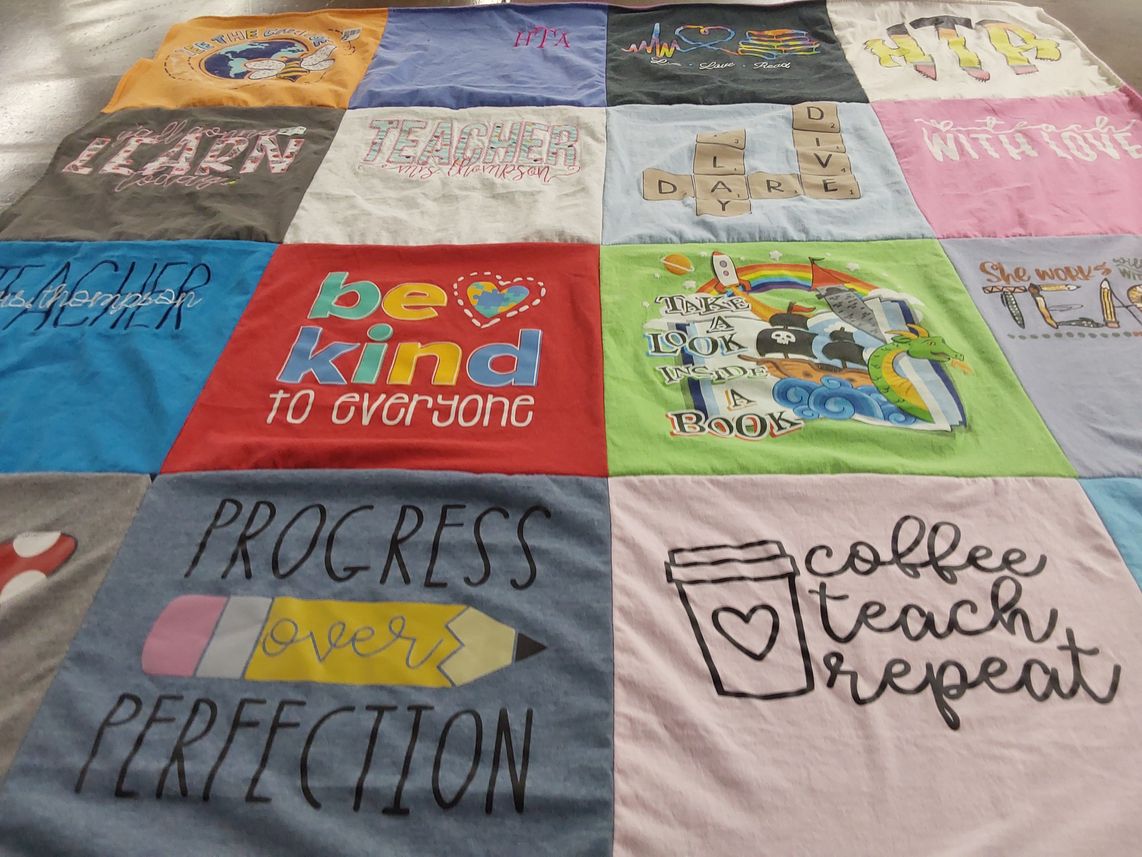 T-shirt quilt with teaching, reading themes by Hope from VA