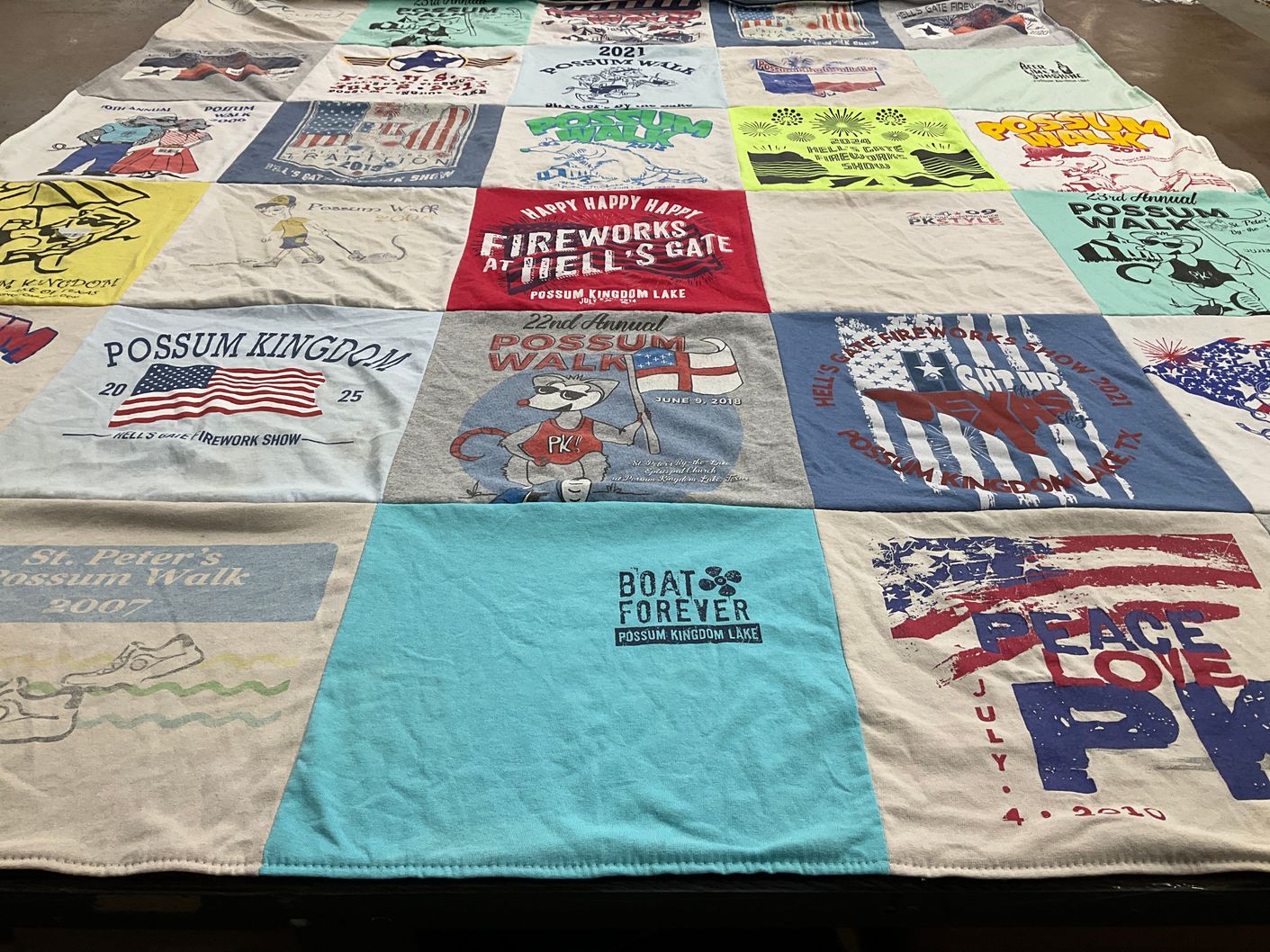 T-shirt quilt with community events, fireworks themes by catherine from TX