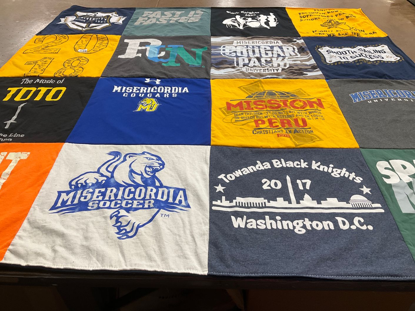 T-shirt quilt featuring towanda black knights, misericordia cougars by Zachary from PA