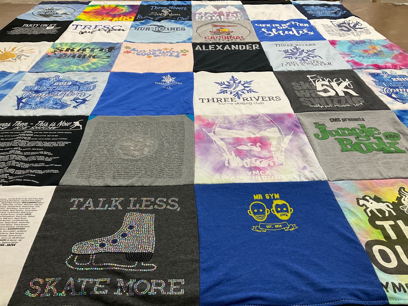 T-shirt quilt with figure skating, theater themes by Andrea from MN