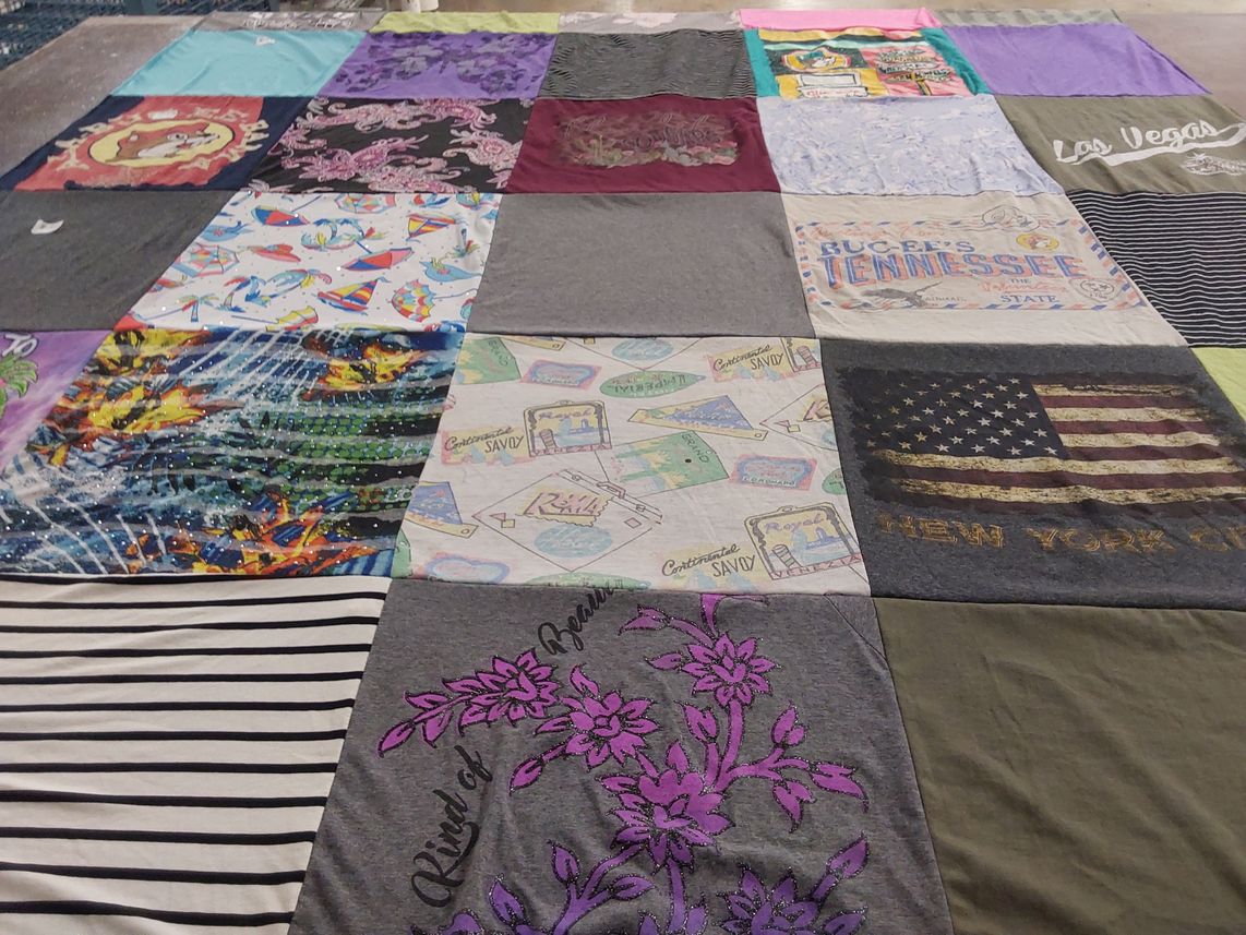 T-shirt quilt with travel, art themes by Kecia from TX