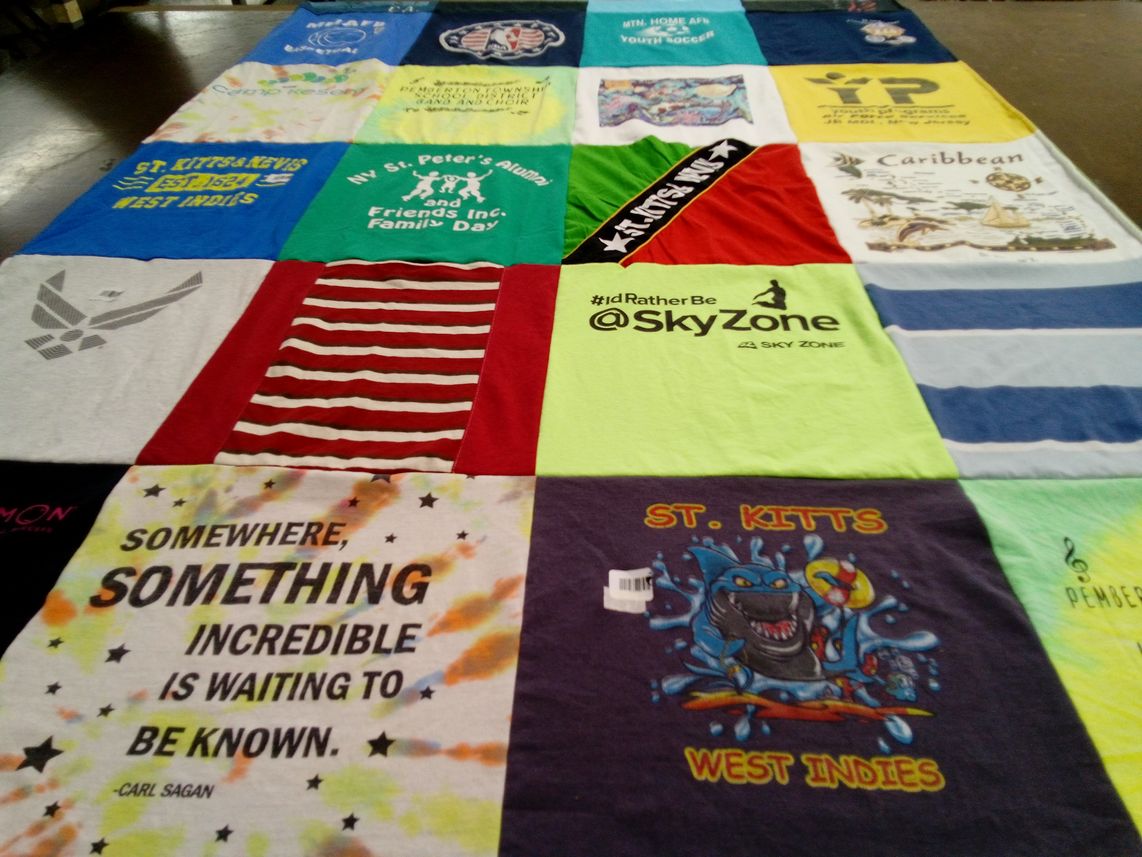T-shirt quilt with travel, education themes by Corrinne from MD