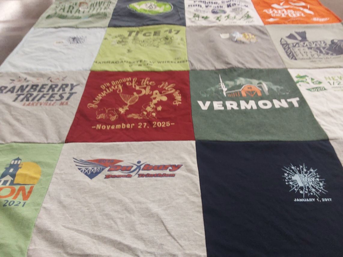 T-shirt quilt with running events, festivals themes by Lisa from MA