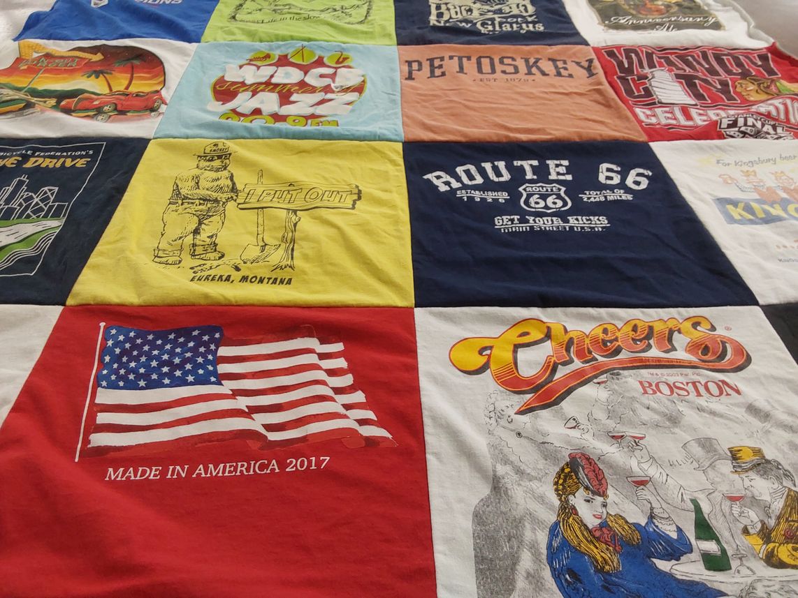 T-shirt quilt with travel, tourism themes by David from IL