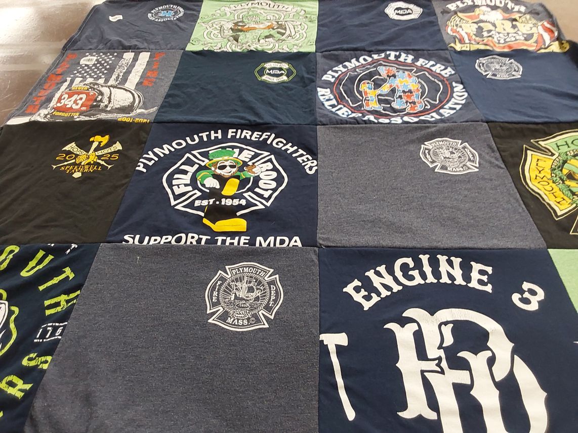 T-shirt quilt with firefighting, community service themes by Lauren from MA