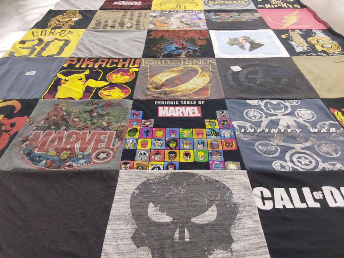 T-shirt quilt with comics, video games themes by Christine A from SC
