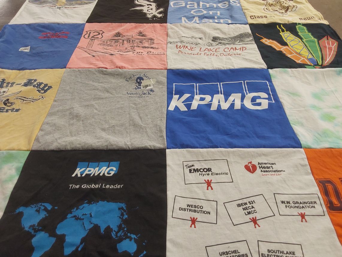 T-shirt quilt with camping, business themes by Cheri from IN