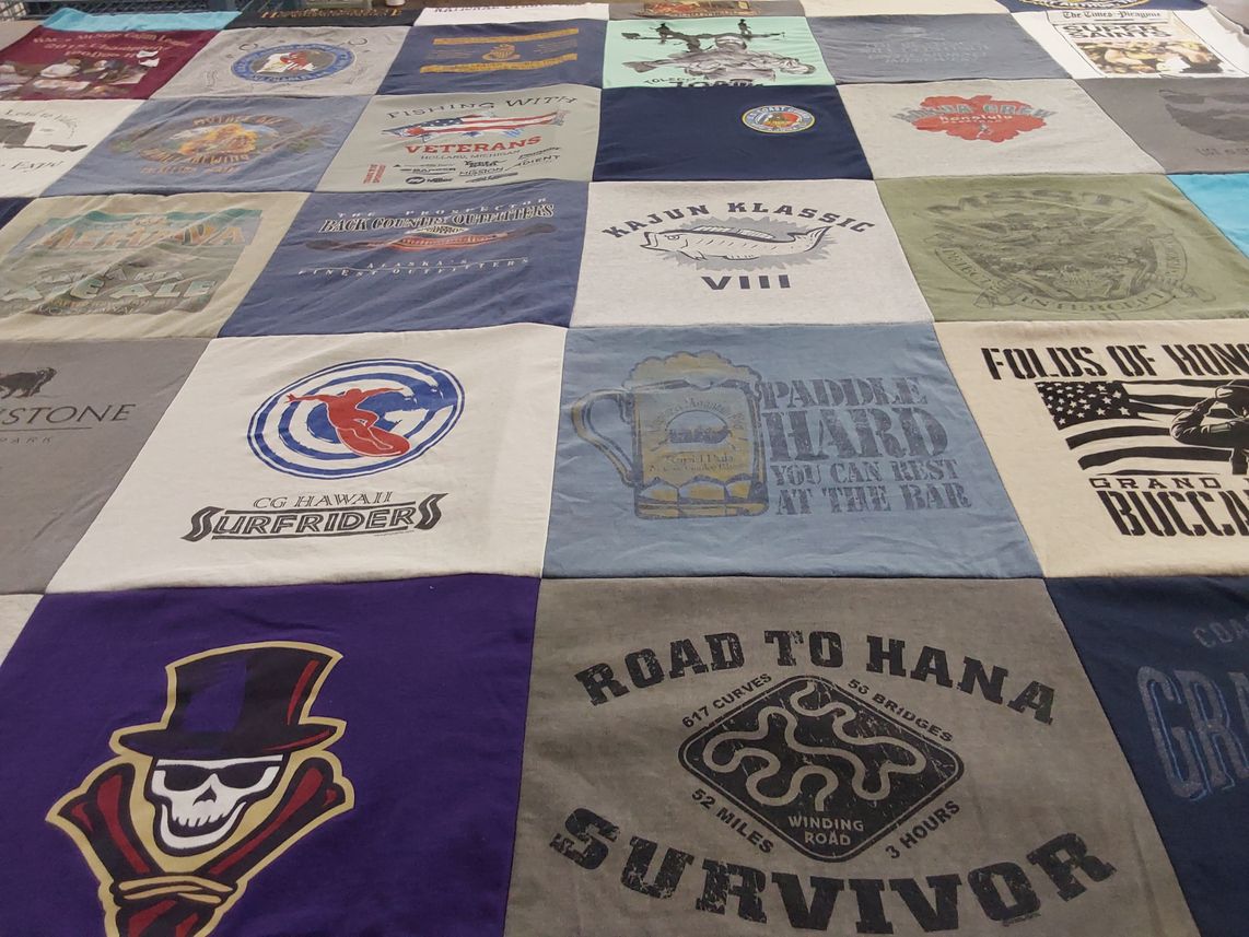 T-shirt quilt with fishing, surfing themes by karl from MI