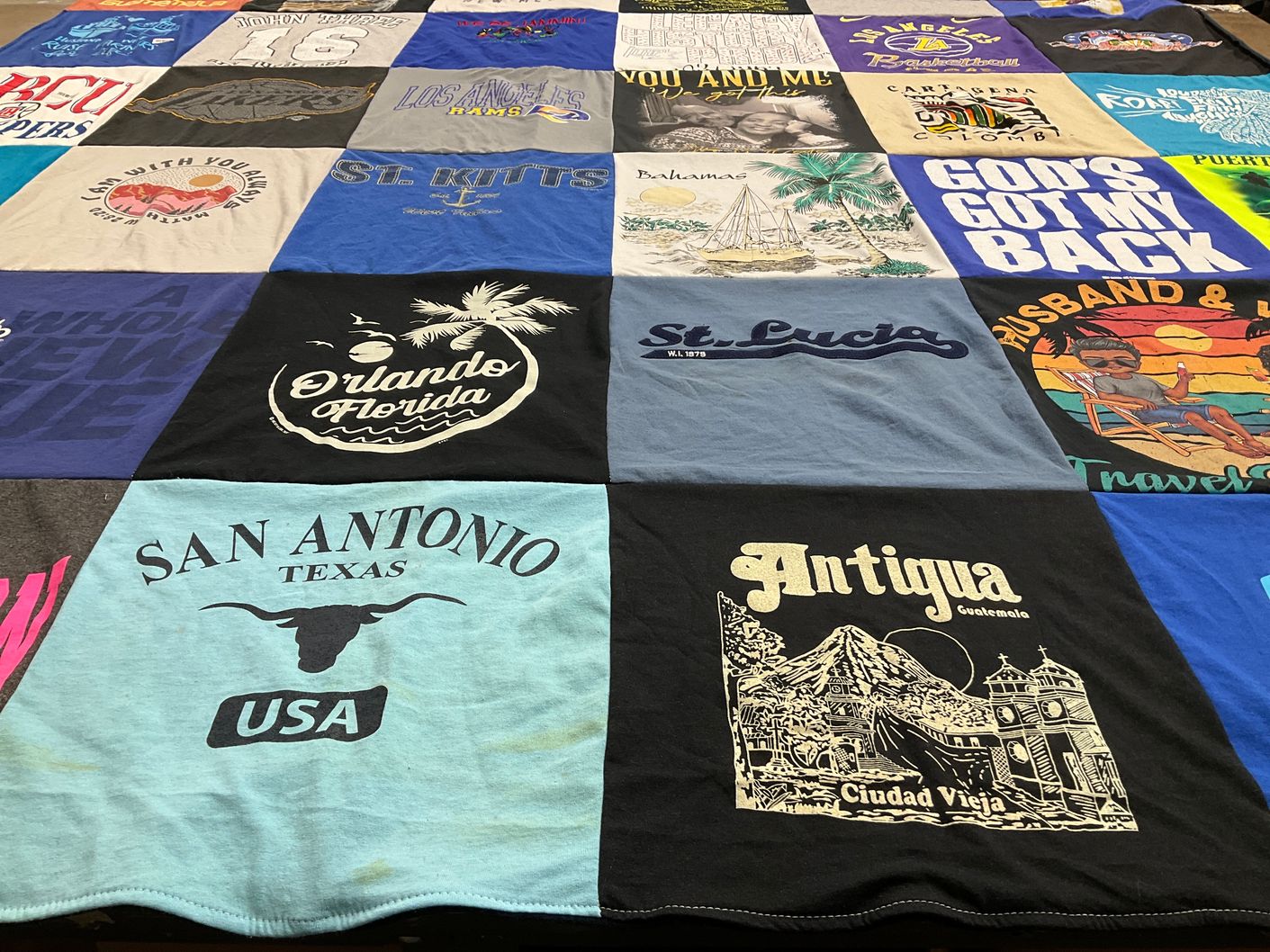 T-shirt quilt with travel, beaches themes by Delilah from CA