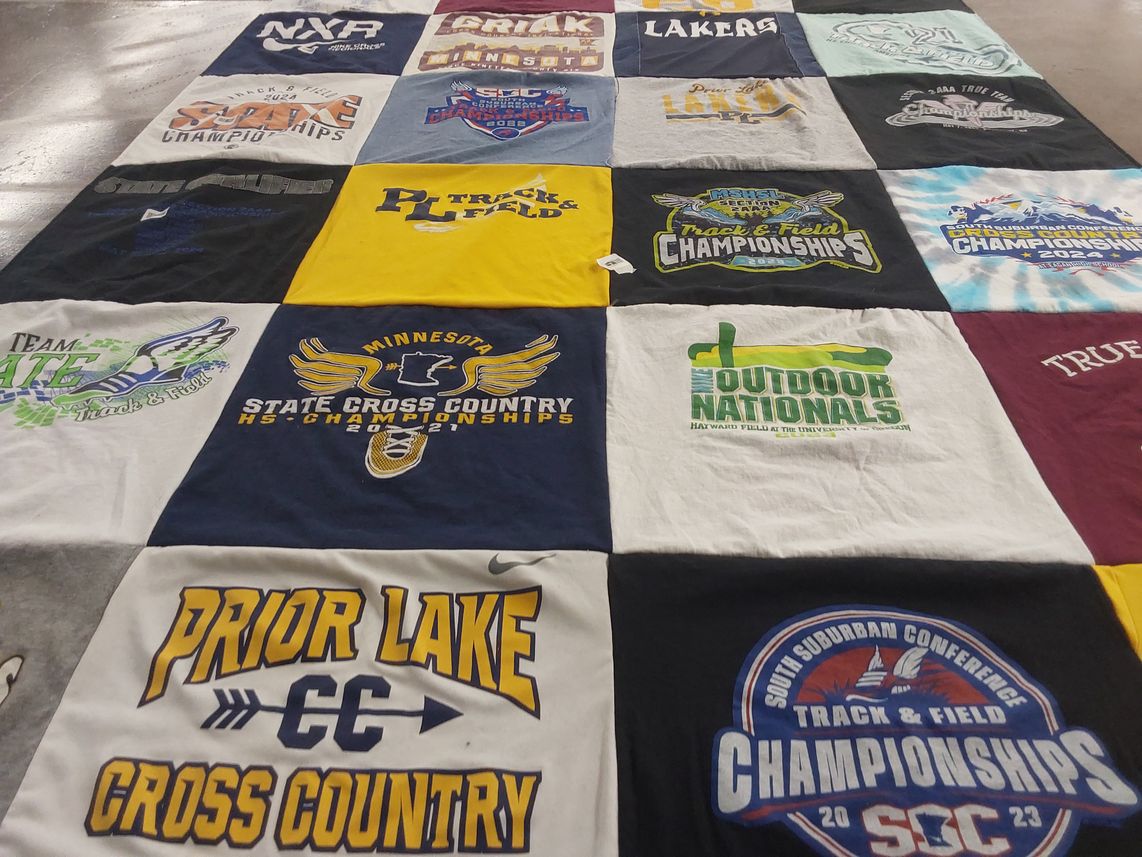 T-shirt quilt featuring team ate track & field by Jennifer from MN
