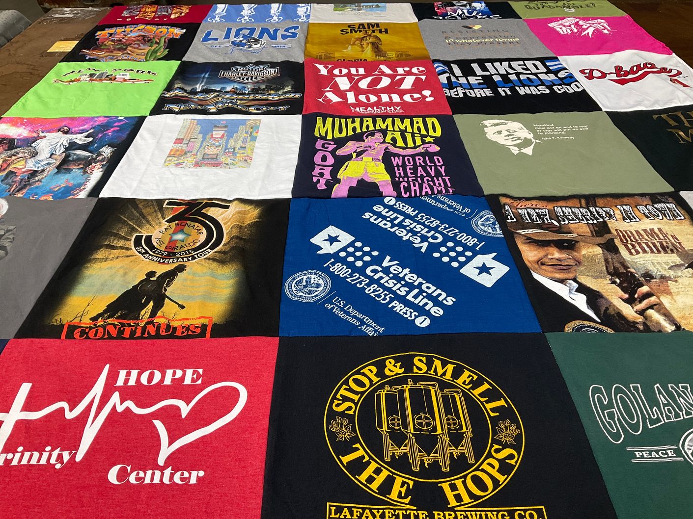T-shirt quilt with sports, history themes by James from IN