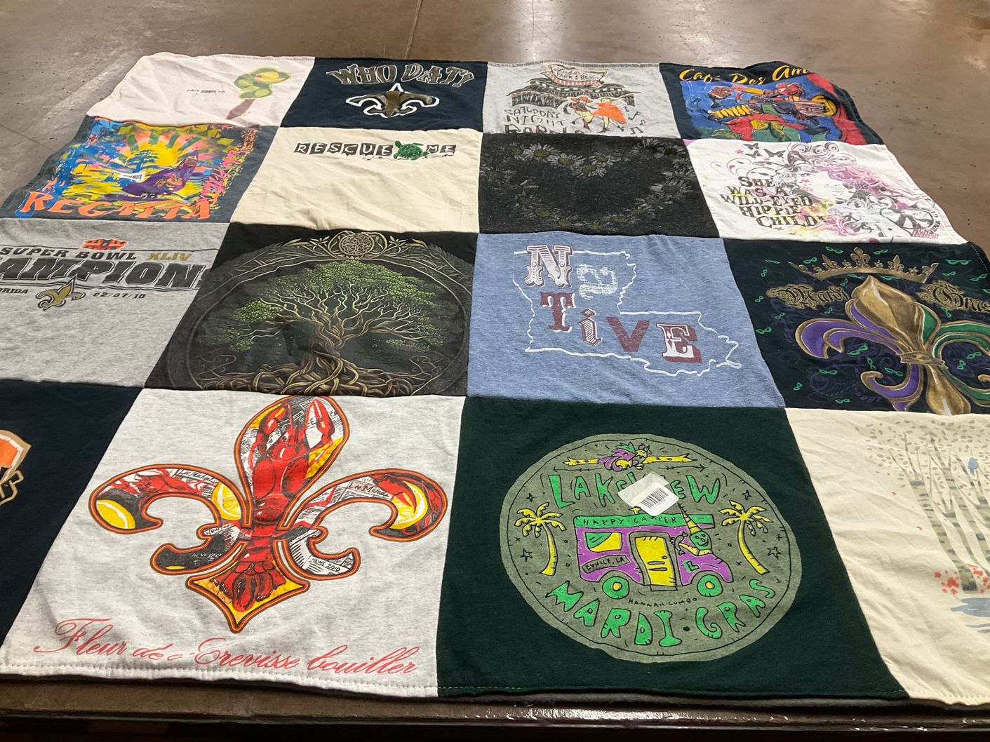 T-shirt quilt with new orleans, mardi gras themes by Erin from TX