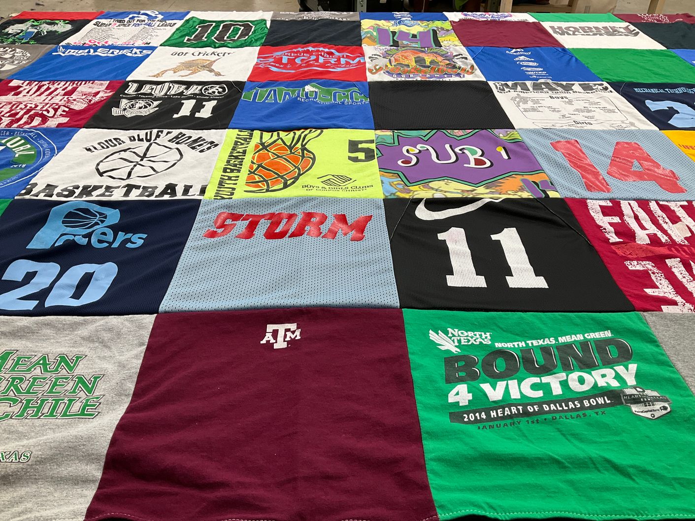 T-shirt quilt featuring north texas mean green by Brandy from TX