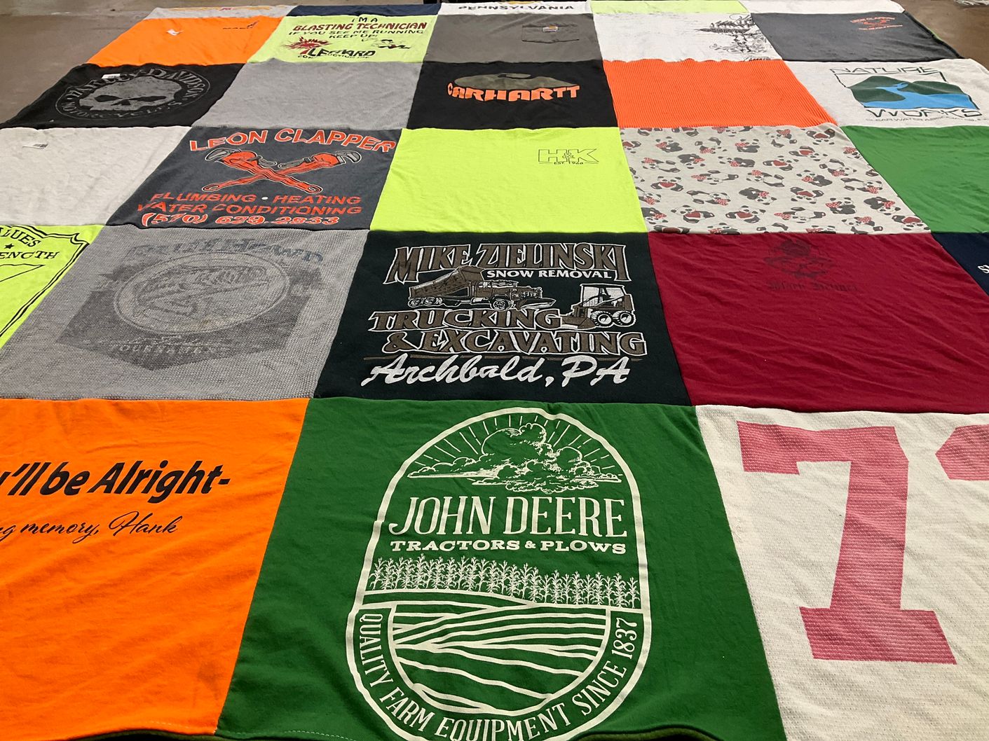 T-shirt quilt with trucking, excavation themes by Kristine from PA