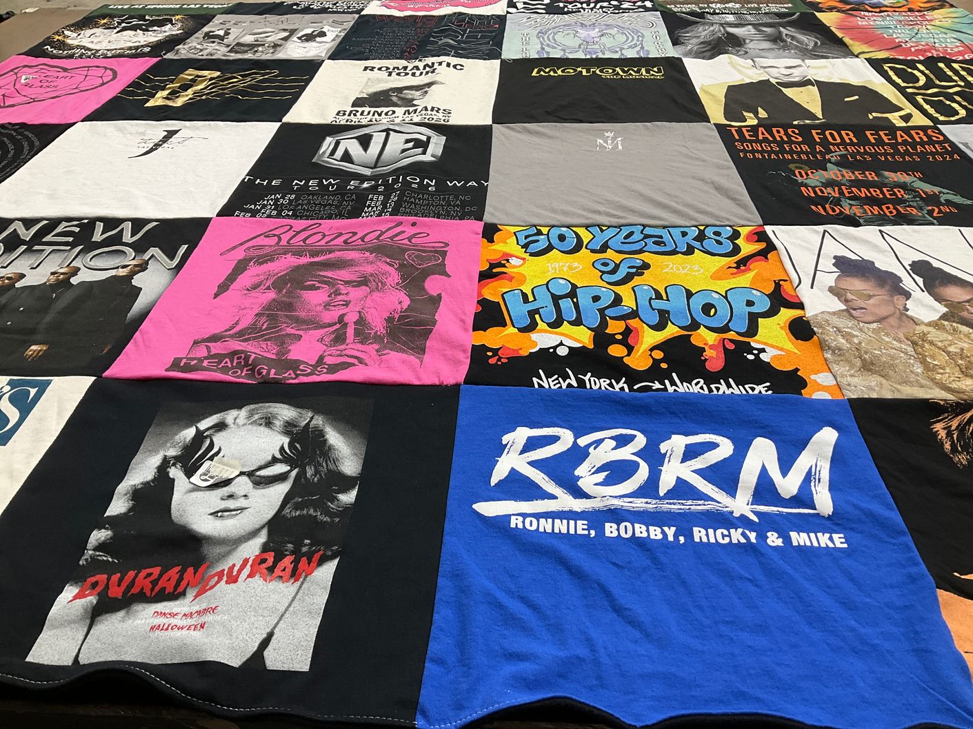T-shirt quilt with music, pop culture themes by Johanna from NV