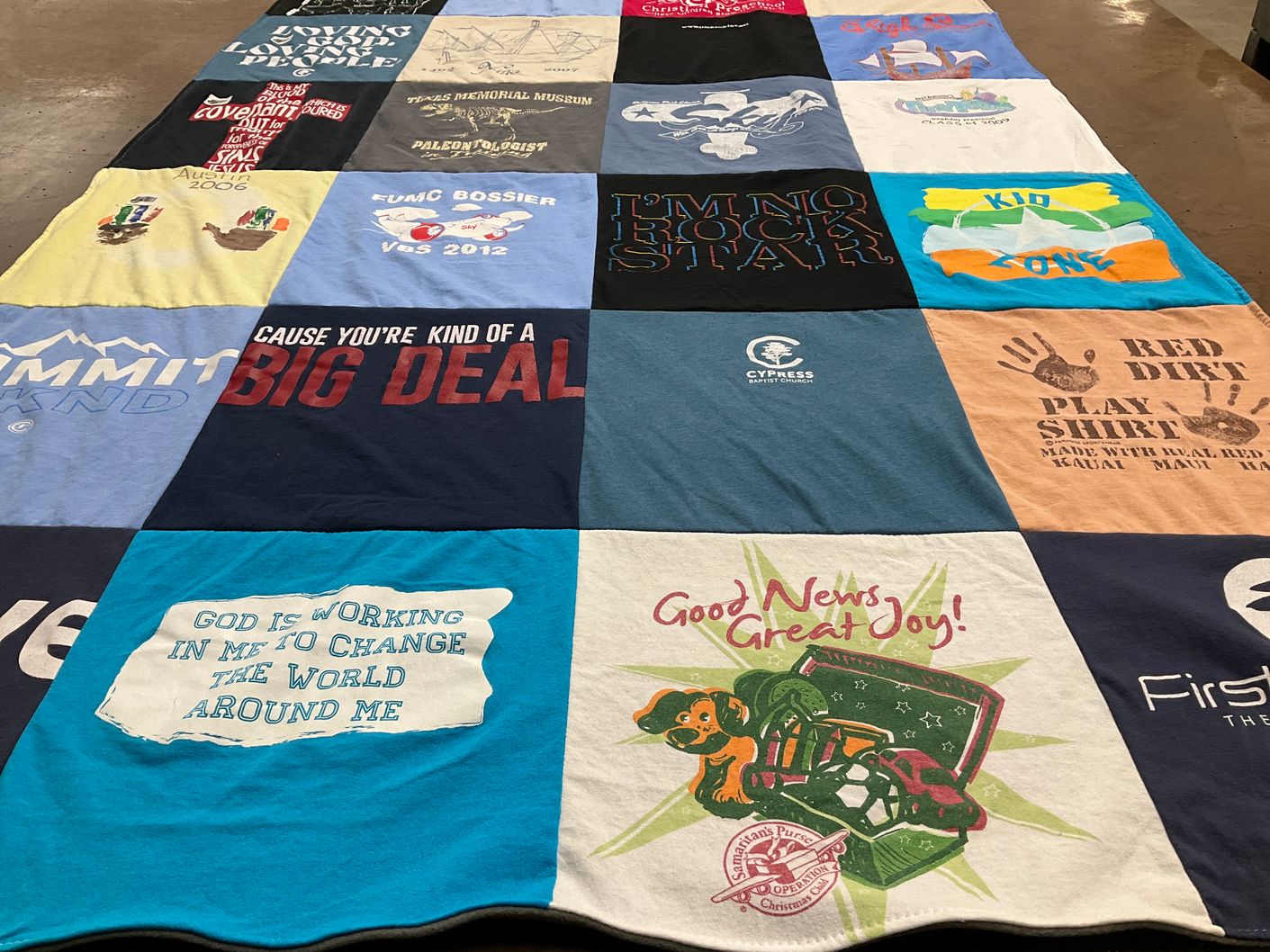 T-shirt quilt with community, faith themes by Alicia from FL