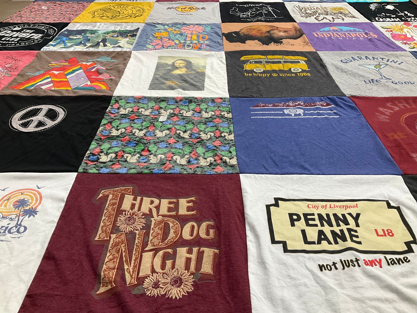 T-shirt quilt with music, art themes by Mona from WY