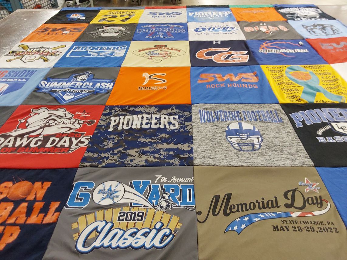 T-shirt quilt featuring wolverine football, pioneers baseball by Megan from PA