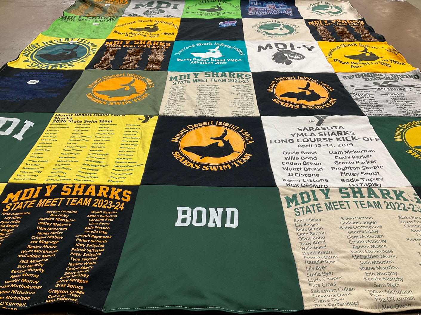 T-shirt quilt featuring mount desert island sharks swim team by Kristi from ME