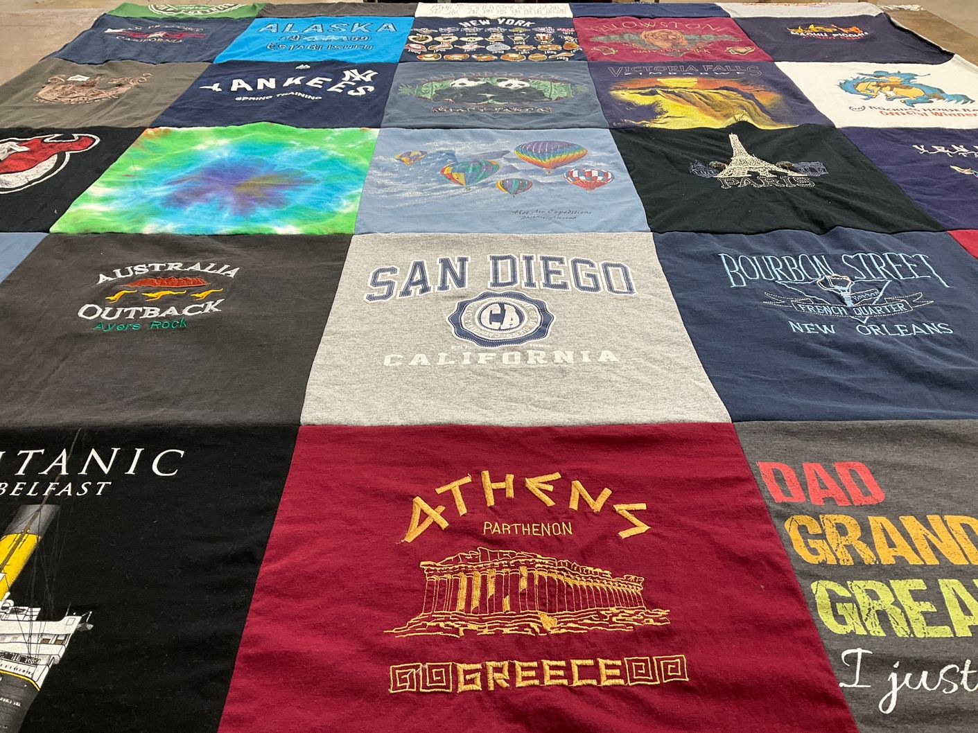 T-shirt quilt with travel, sports themes by Andrea from NJ