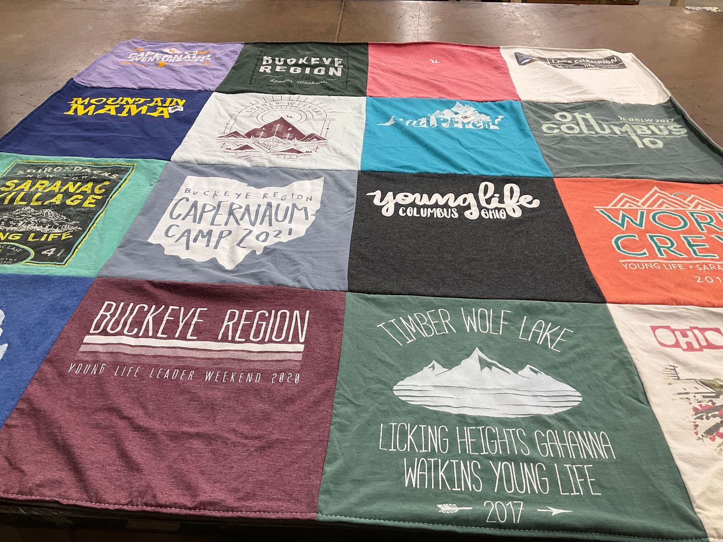 T-shirt quilt with camping, outdoor activities themes by Sue from OH