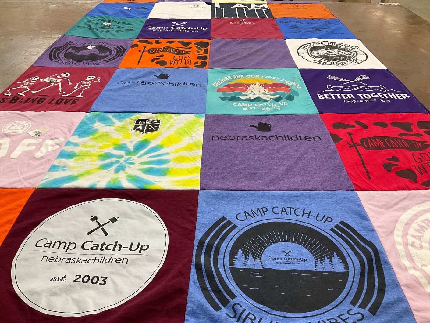 T-shirt quilt with camping, outdoors themes by Mona from NE