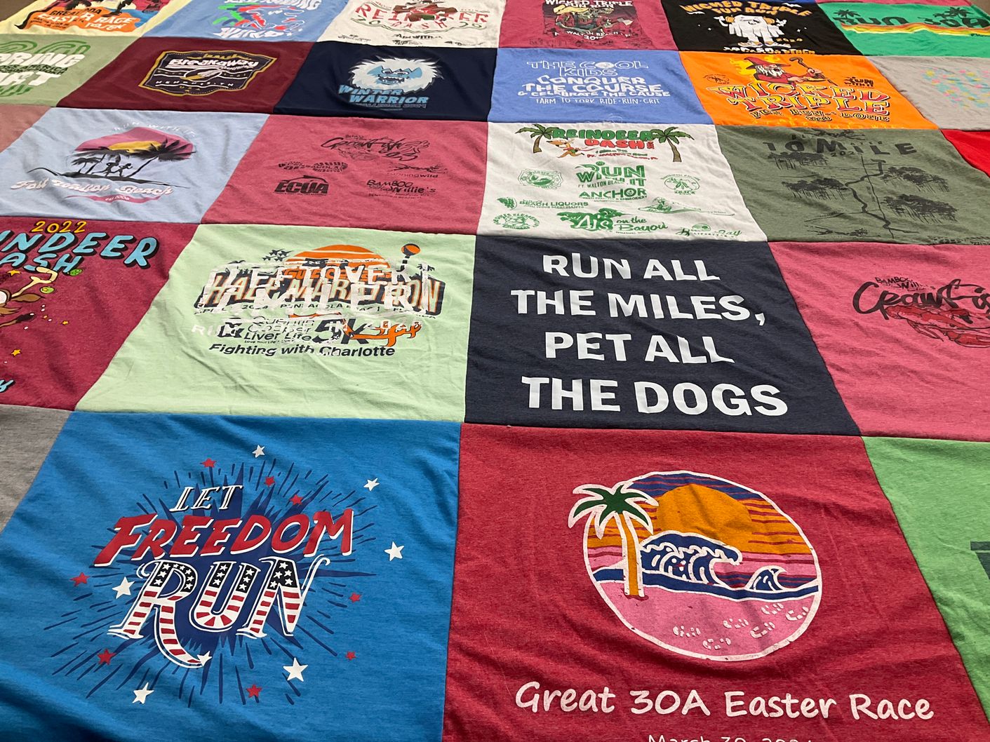 T-shirt quilt with running, ocean themes by KIMBERLY from FL