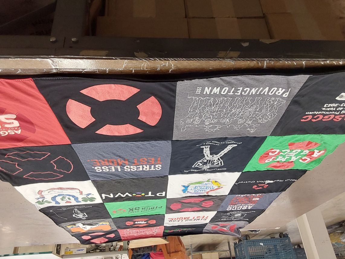 T-shirt quilt with community, health themes by Jean from MA
