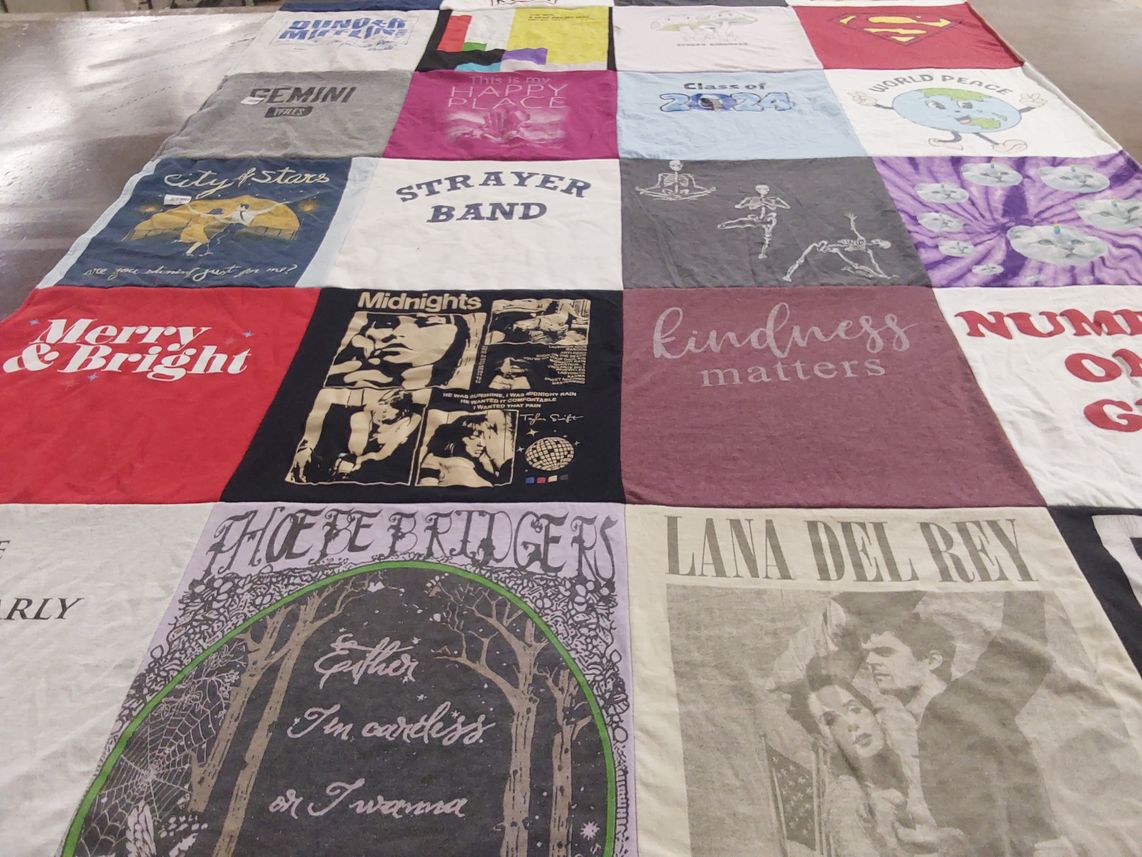 T-shirt quilt with music, art themes by Susan from PA