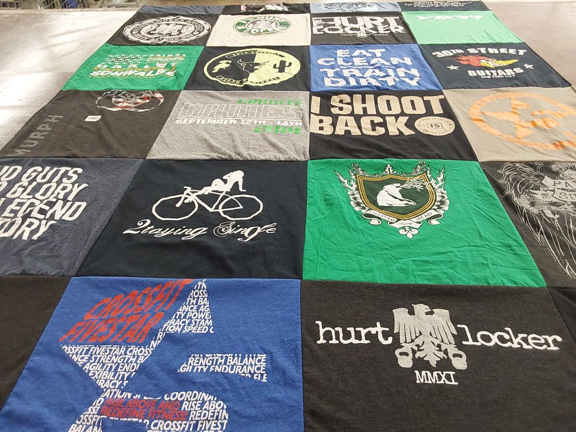 T-shirt quilt with fitness, cycling themes by Marianne from PA