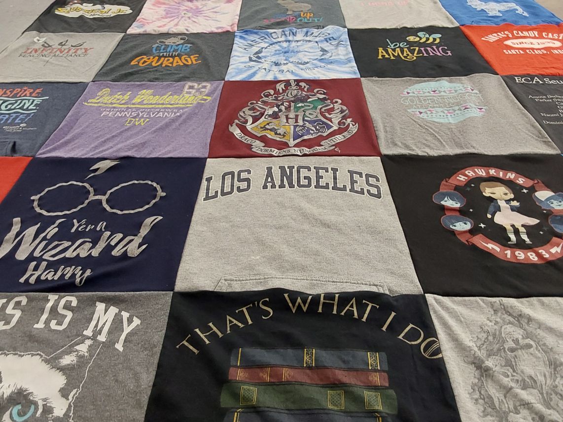 T-shirt quilt with wizardry, fantasy themes by Renee from NJ